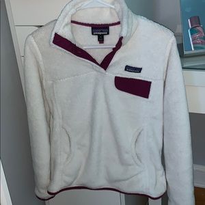 White and purple Patagonia sweater